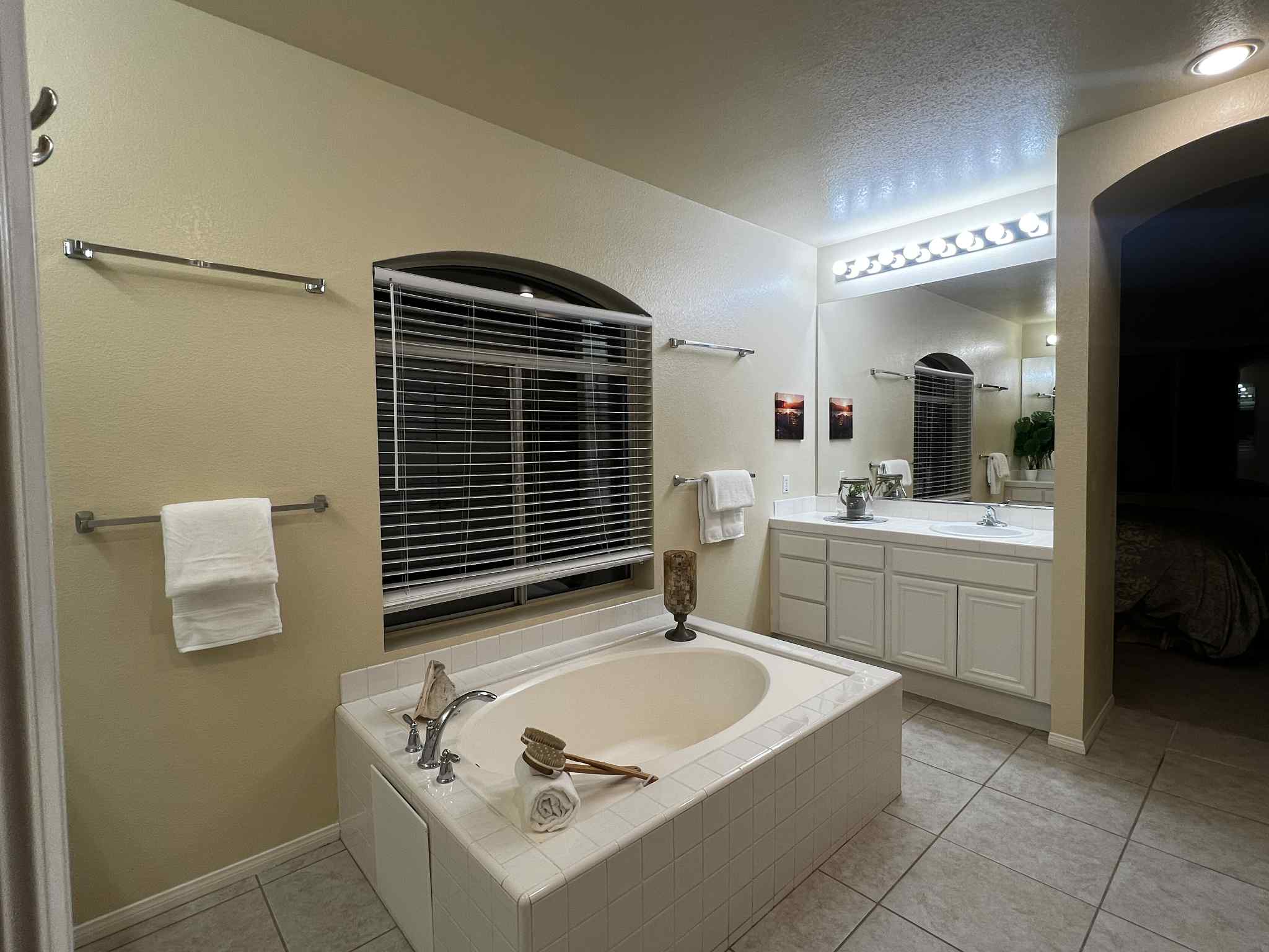 San Pasqual Retreat Primary Bath - bright spa-like bath with deep soaking tub and double vanities