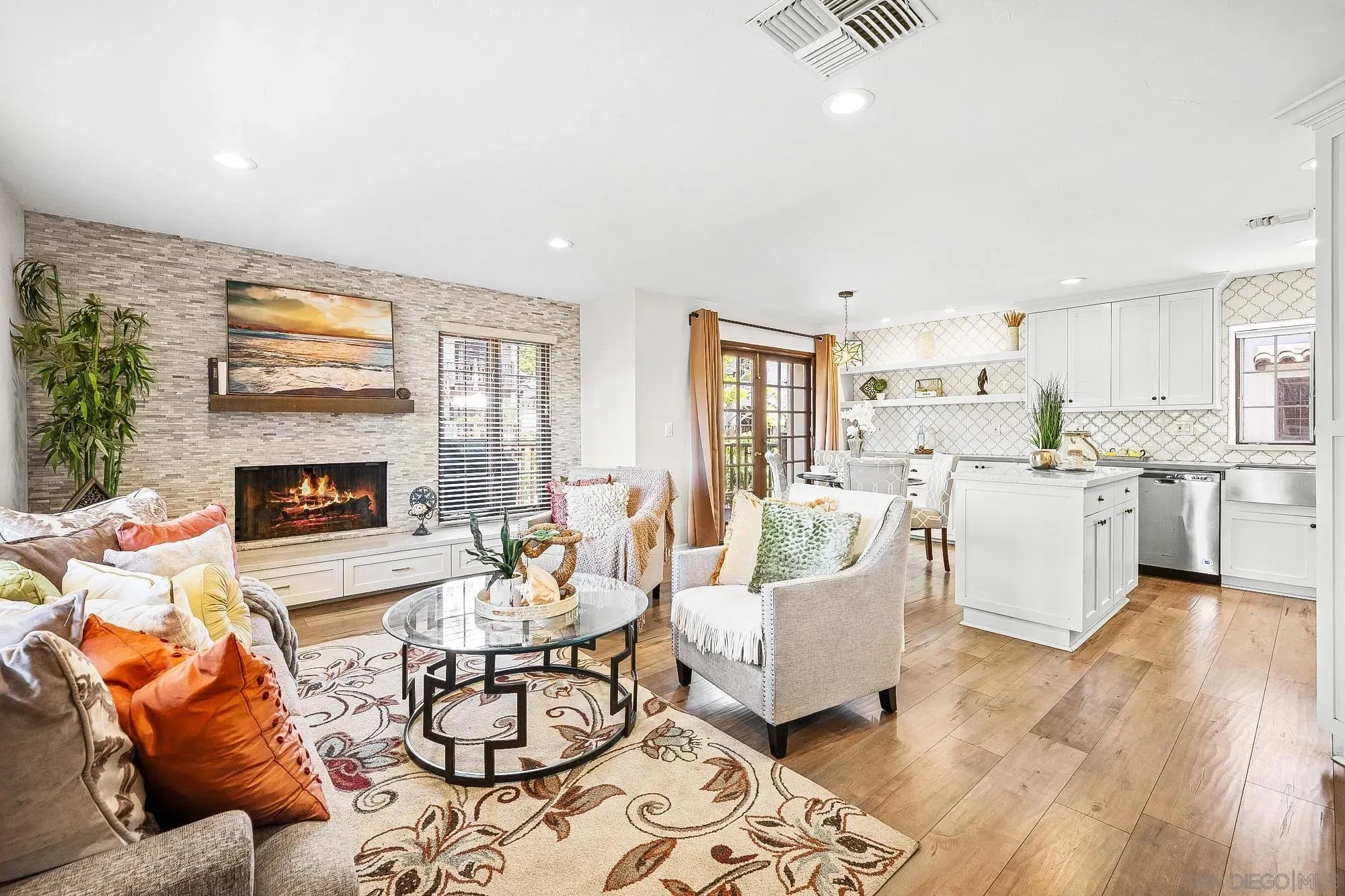Canyon View Condo living room with stone fireplace and modern furnishings