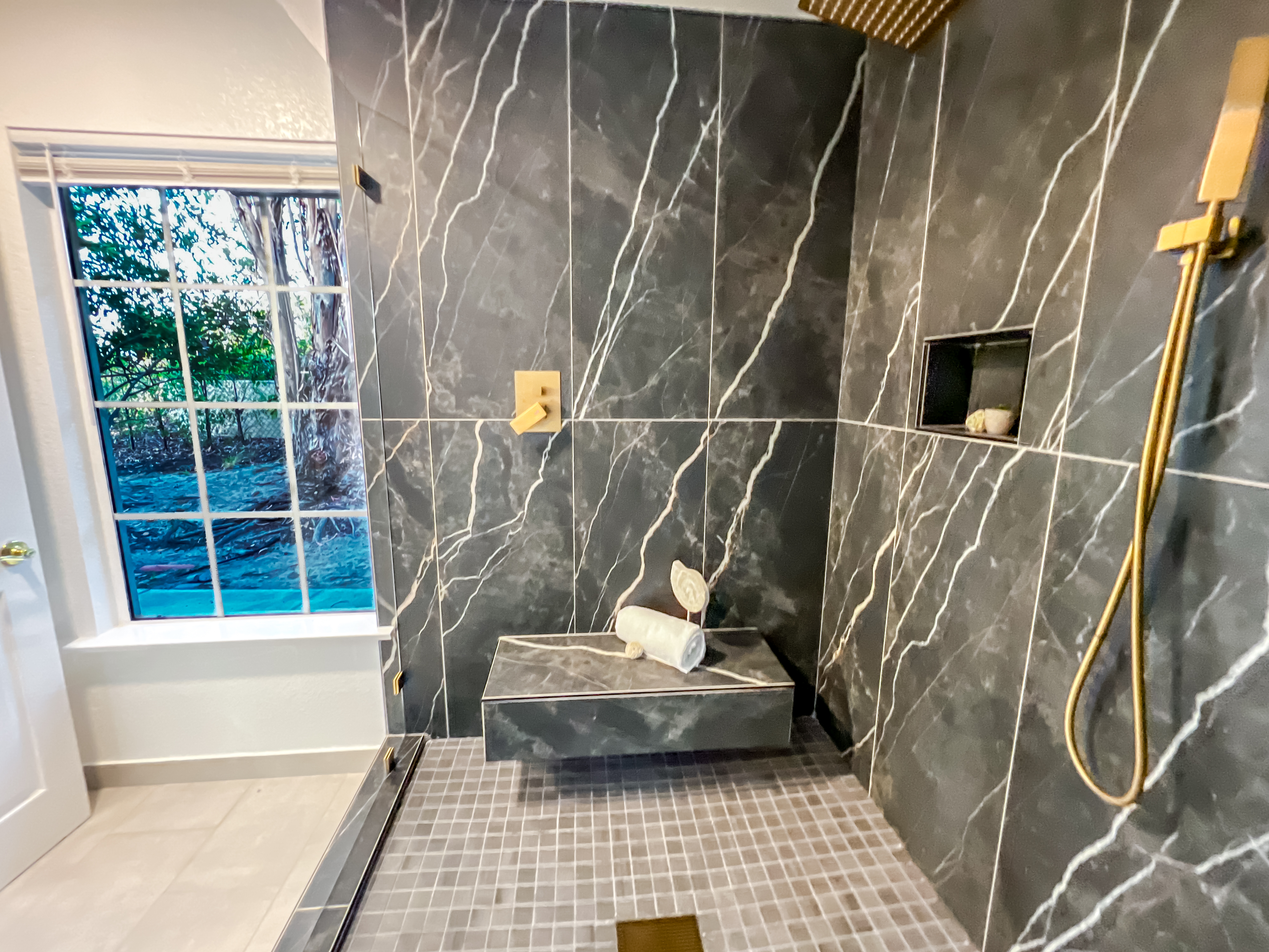 Monte Fuego Ranch bathroom left unstyled to highlight premium tile and fixtures